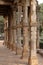 Columns with stone carving in courtyard of Quwwat-Ul-Islam mosque, Qutab Minar complex, Delhi