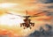 Combat helicopter flying in formation on background of colorful sunset with clouds. Stylised military scene. Hand drawn