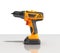 Combi drill impact drill and driver on glass background 3d