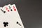 The combination of playing cards poker casino. Four aces on gray background