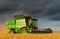 Combine harvester harvesting barley in a field