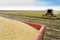 Combine harvester harvesting soybean at field