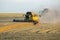 Combine harvester harvests wheat in the field. agronomy and grain industry