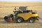 Combine harvester harvests wheat in the field. agronomy and grain industry