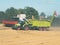 Combine Harvester Unloading Grain