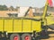 Combine Harvester Unloading Grain