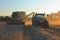 Combine harvester unloading wheat