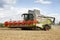 Combine harvester wheat field