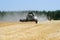 Combine harvesters working on a wheat field