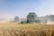 Combine harvesters working on a wheat field