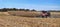 Combine harvesting a corn field in Northern Illinois beautiful farm field panorama