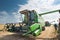 Combine harvesting soybeans