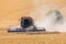 Combine harvesting wheat in the Palouse hills