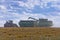 Combine loading harvest into grain cart