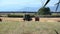 Combine unloading the harvest