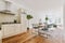 Combined dining room with beige kitchen