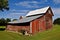 Combined granary and tractor shed