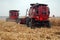 Combines are harvesting corn