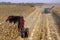 Combines Harvests Corn