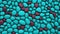 Combining maroon and teal 3D stones to create a multicolored abstract background 3D render