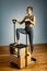 Combo wunda pilates chair woman instructor fitness yoga gym exercise. Copy space. sports banner