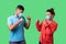 Come on let`s fight! Portrait of couple with surgical medical mask standing together, keeping fists clenched and looking at each