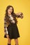 Come with me. Hey you. Manners of hothead. Girl long hair cool pointing forward. Child pointing camera yellow background