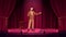 Comedy stand up show with talent female comedian, woman standing with microphone on stage