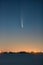 Comet Neowise, rising over the coast in the early morning twilight hours.