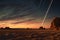 comet trails in night sky above vast desert expanse