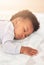 Comfort, bed and baby sleeping in home on blanket for rest, nap time and dreaming in nursery. Childcare, newborn and