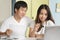 Comfort e-commerce shopping, Asian couple shopping online and payment by credit card