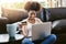 Comfortable consumerism. an attractive young woman shopping online while chilling at home on the sofa.