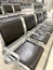 comfortable metal rows of seats in bright airport lounge, Airport waiting room, concept passenger traffic, delay, flight
