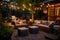 comfortable patio seating area with lit lanterns