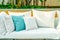 comfortable pillows on outdoor patio chair and table