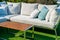 comfortable pillows on outdoor patio chair and table