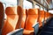 Comfortable seats in empty modern passenger in sunny light. Generate Ai