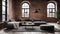 Comfortable sofa placed on rug near brick wall with lamps and black round tables in spacious room with windows in apartment