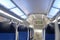 Comfortable soft blue seats with headrests in half-empty train car in Germany, concept of long-distance travel, ticket for