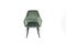 Comfortable velours green armchair on white background. Interior element