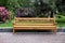 Comfortable wooden bench in beautiful garden