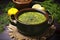 A comforting bowl of green lentil soup elegantly served on dark ceramic.