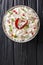 Comforting Curd Rice is a popular dish from South India with yogurt and then tempered with spices closeup in a plate. Vertical top