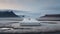 Comfy white master bed on the black sand surrounded by Iceland landscape.