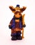 Comic figurine of a moose standing with skis