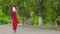 Comical mime walks on stilts and juggling