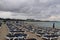 Coming storm threw all the people into the hotel. beautiful beach in Cyprus in bad weather. Ayia napa beach with many deck chairs