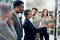 Coming up with a strategy for success. Shot of a group of businesspeople brainstorming on a glass wall in an office.