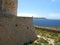 COMINO, MALTA - Apr 27, 2014: View of Santa Marija Tower, standing guard over the cliffs and blue sea of the island of Comino